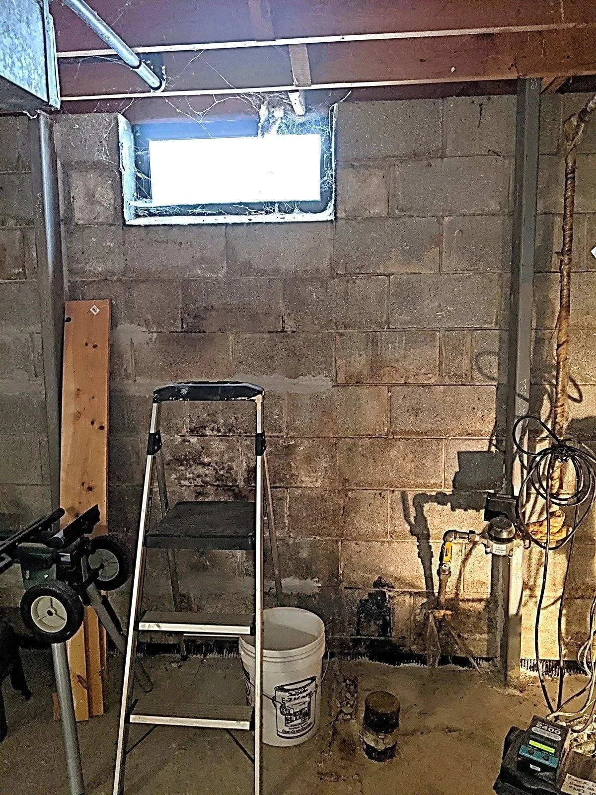 Tuckpointed joints across the whole wall, with braces too far apart. Wall displacement will very likely continue.