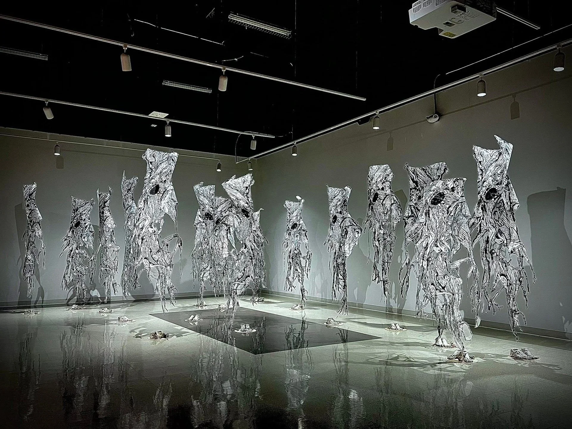 Installation view of Candace Garlock Never Out of the Woods at TMCC fall 2025