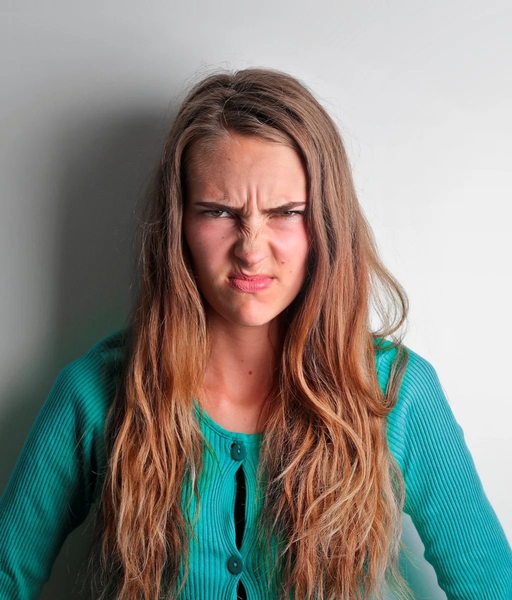 Young_Woman_With_Upset_Expression
