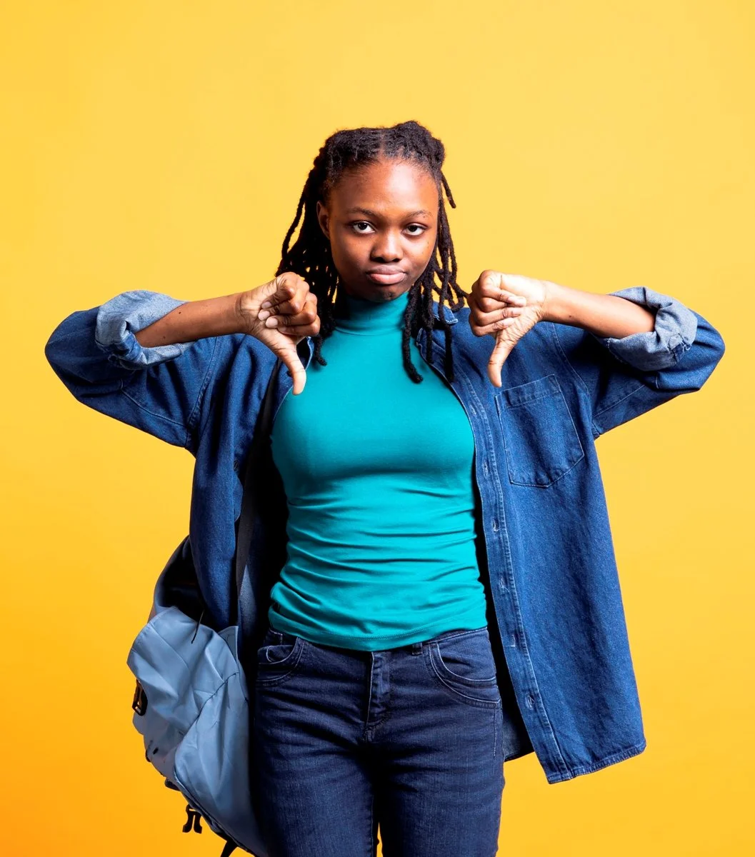 Upset_Woman_Showing_Thumbs_Down