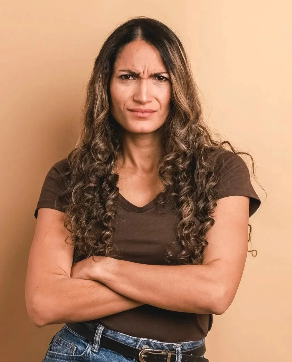 Woman_Upset_Standing_Crossing_Arms