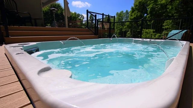 Hot tube outdoors with deck