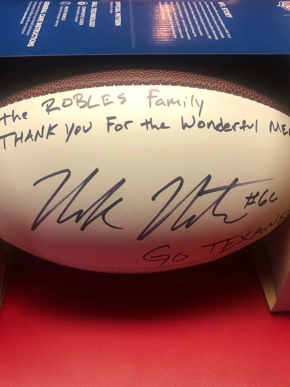 Autographed football with a thank you note addressed to the Robles family, thanking them for the wonderful message, signed with initials and the number 66.