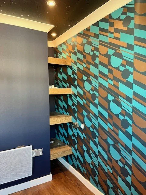 Bedroom full redecoration including feature wall wallpaper installation in Colchester, Essex bold modern design by Bergman Decorations