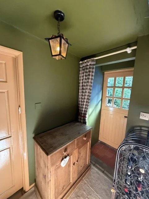 Utility entrance redecorated with freshly painted walls, ceiling and woodwork for a durable finish that suits this character property in Tollesbury.