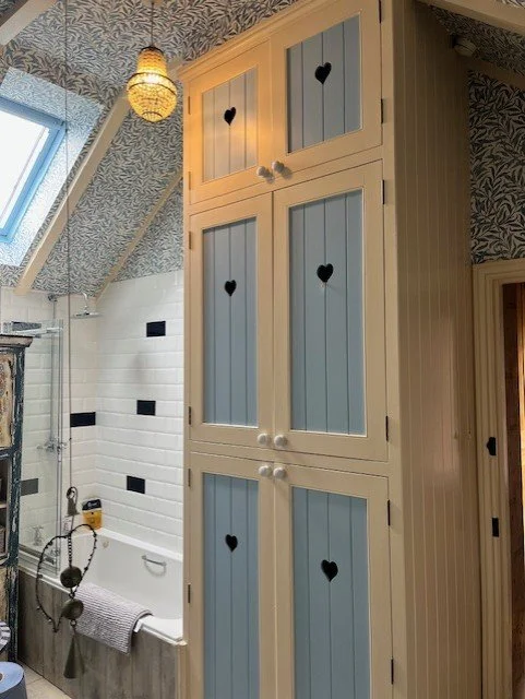 Bathroom full redecoration with wall and ceiling wallpaper installation in Tollesbury, Essex by Bergman Decorations