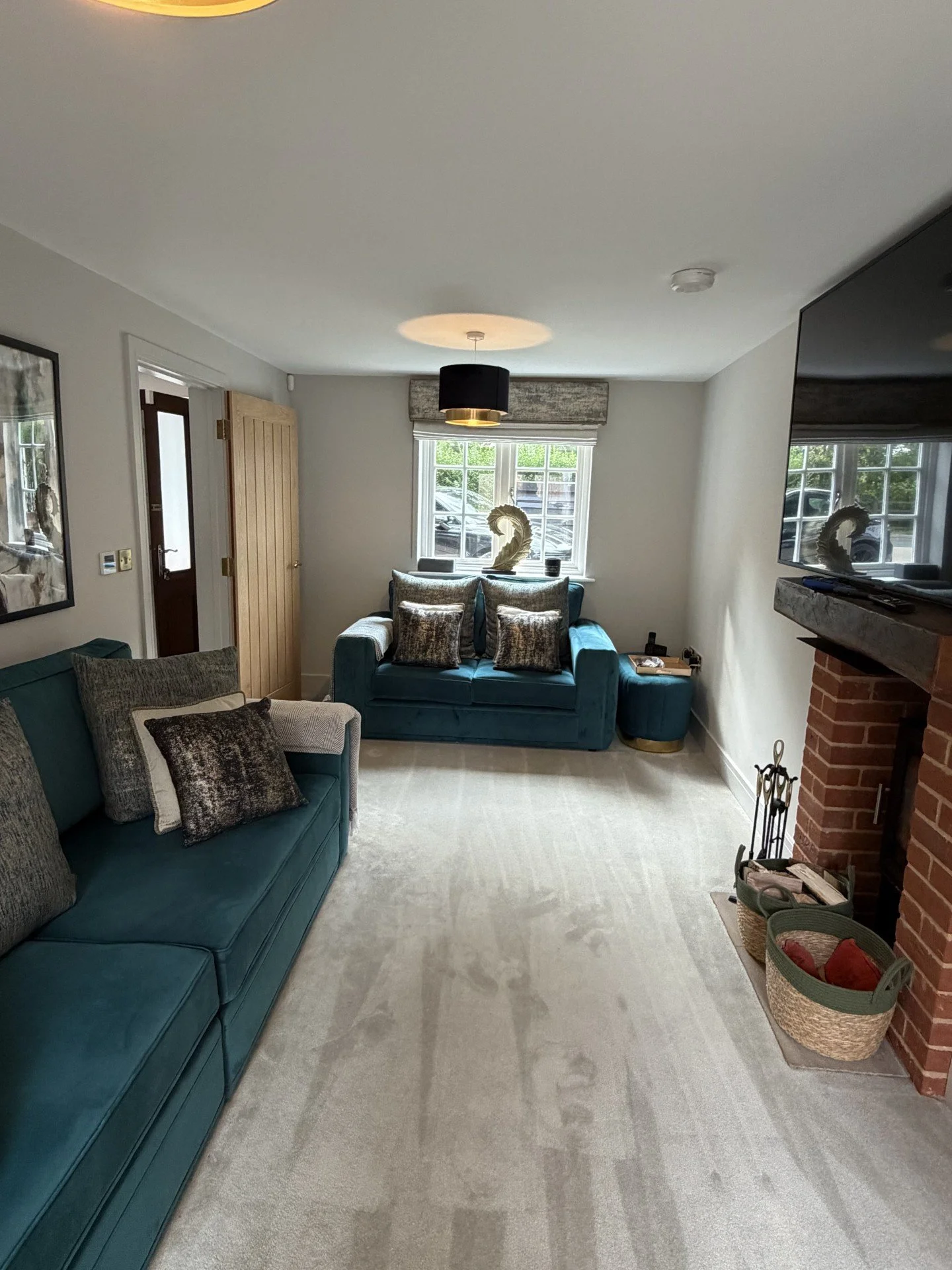 Professional lounge decorating project in Sandon, Chelmsford, with freshly painted ceilings, walls and woodwork for a high-quality, durable finish and a bright, refreshed living space.