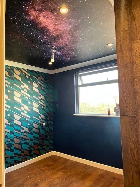 Bedroom full redecoration including ceiling wallpaper installation in Colchester, Essex statement feature design by Bergman Decorations