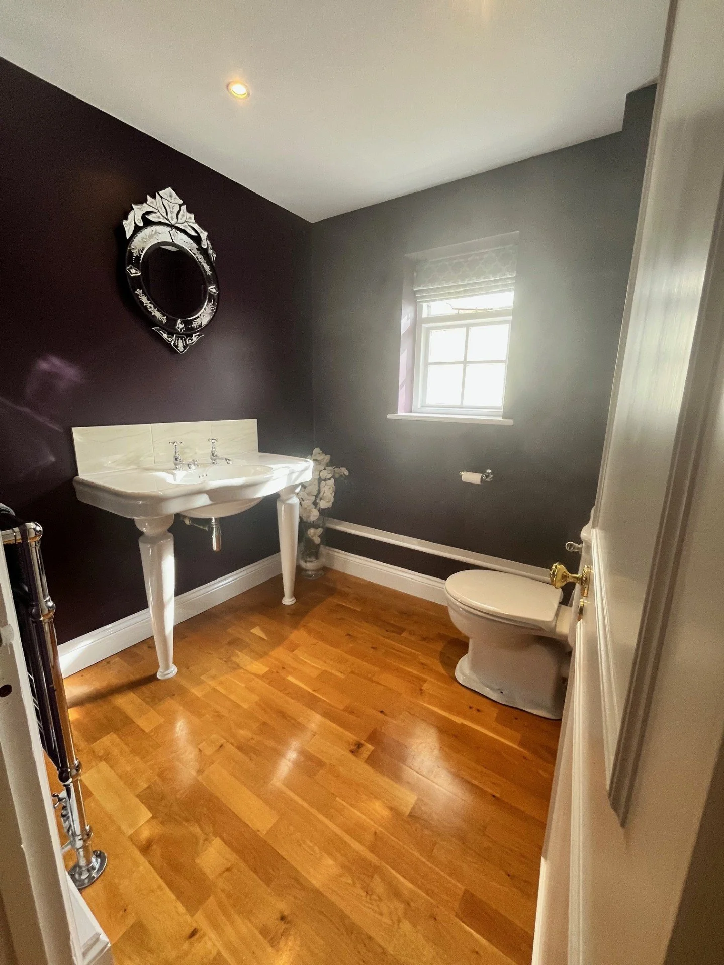 Bathroom painting project completed in Dedham, Suffolk using Farrow and Ball Pelt. Walls prepared and finished to a high standard for a clean, durable result.