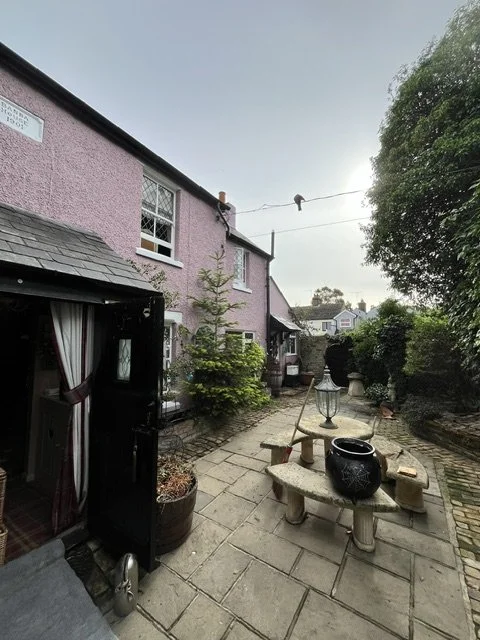 Freshly painted rendered property in Tollesbury showcasing professional exterior decorating work.