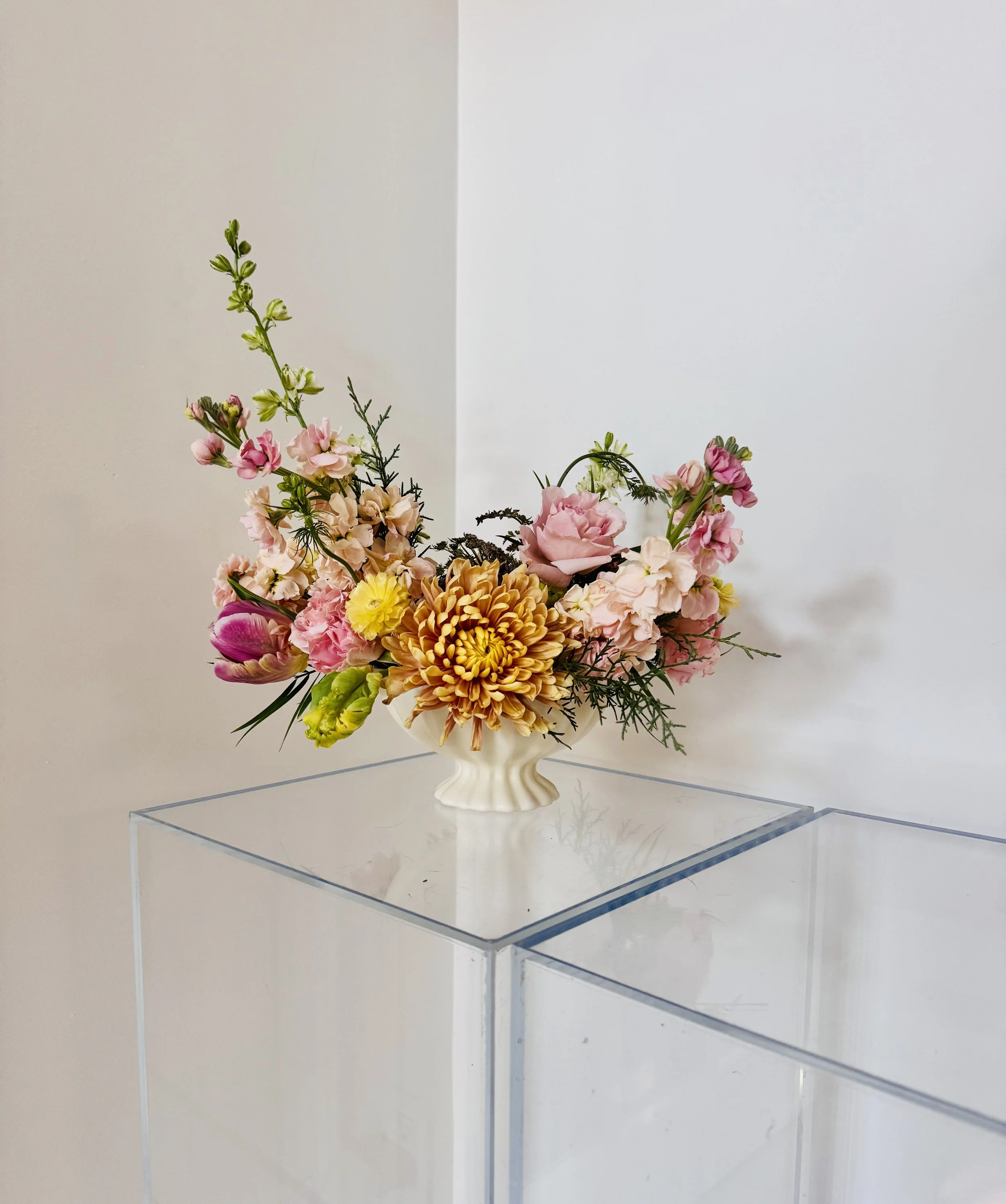 Spring Garden Arrangement in compote Vase with pink flowers .jpeg