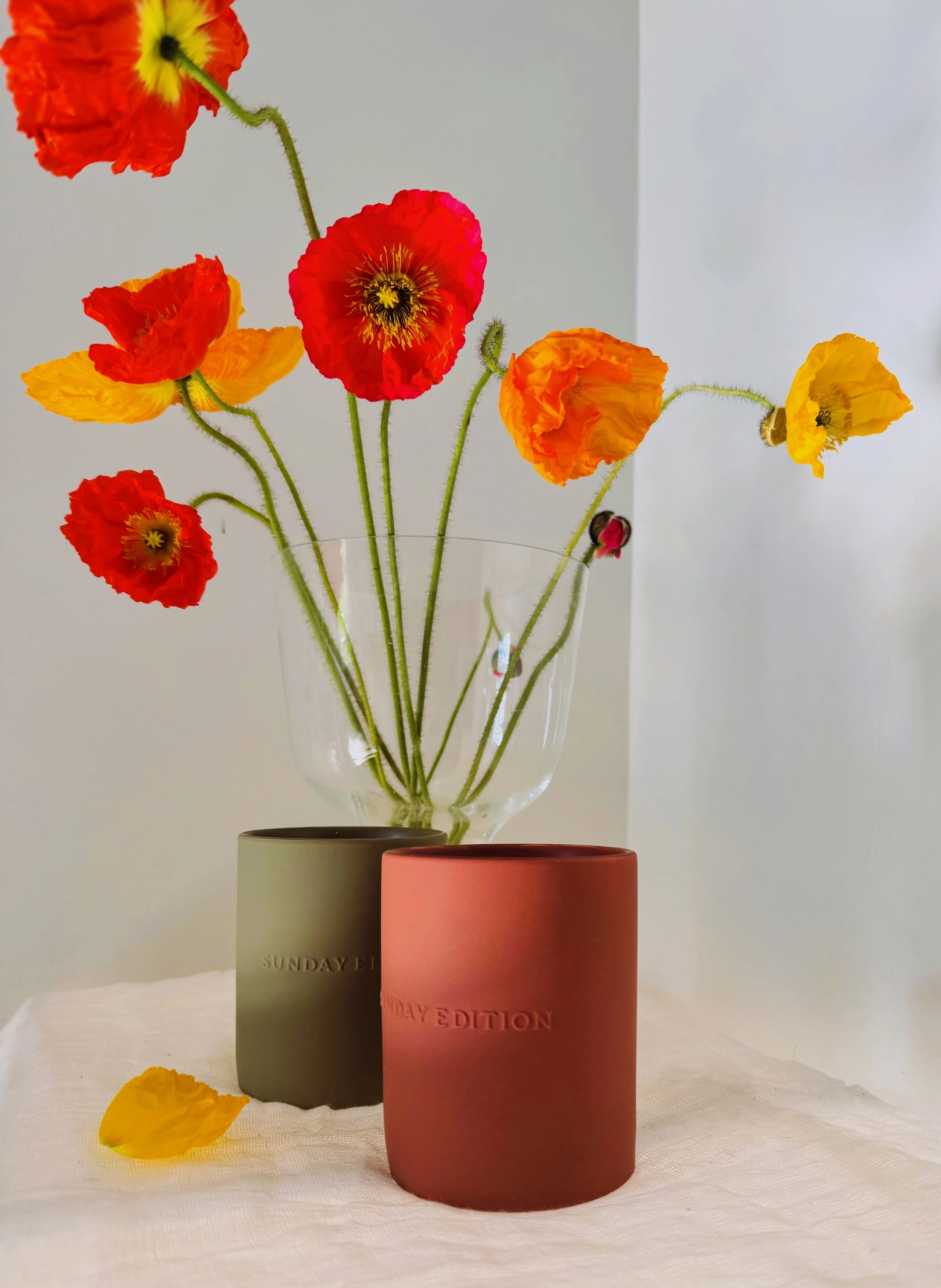 Sunday Edition Fragrant Candle Lifestyle with poppies. jpeg.webp.jpeg