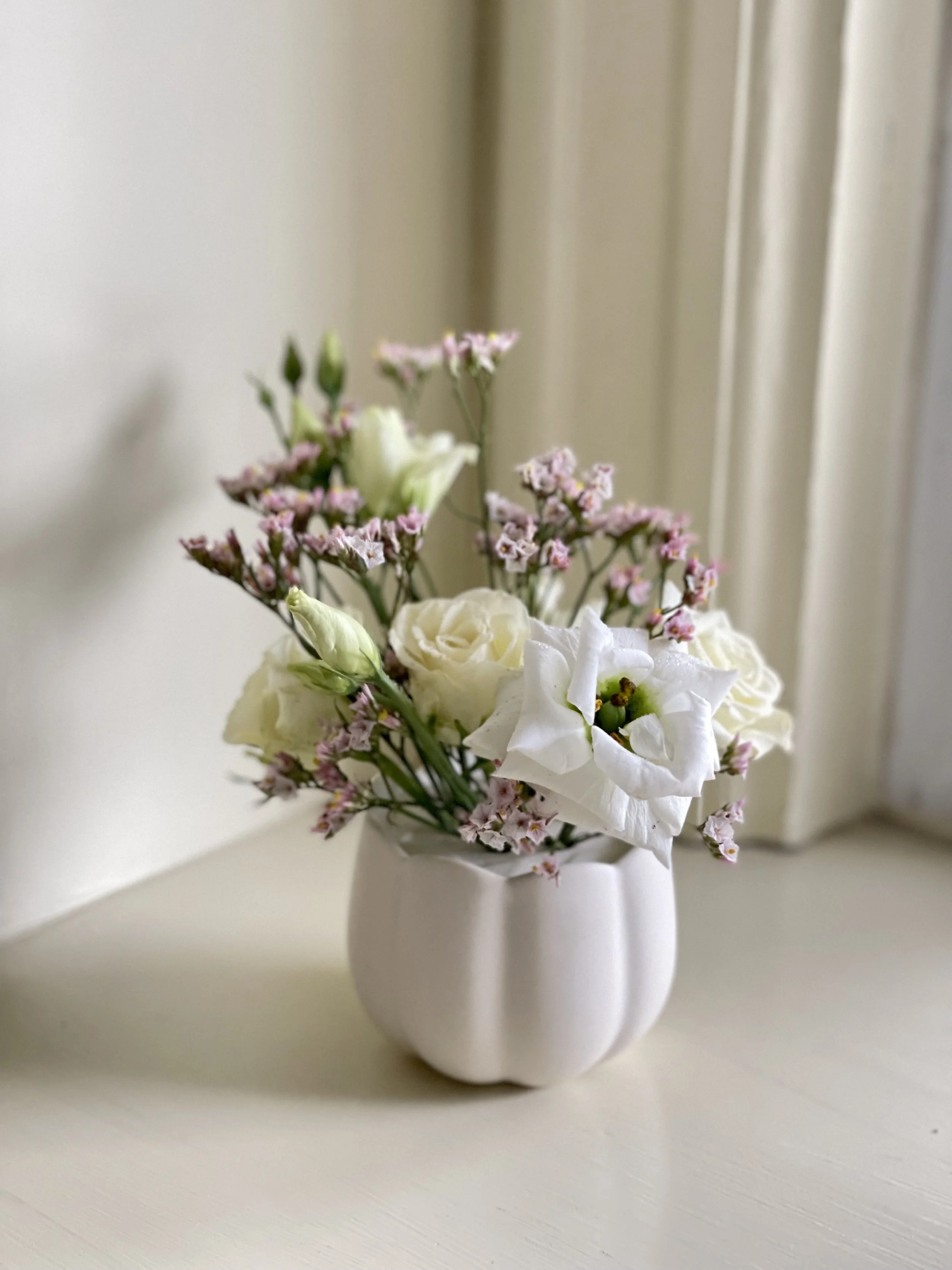 Ceramic Frog vase small with lisianthus and white roses .jpg