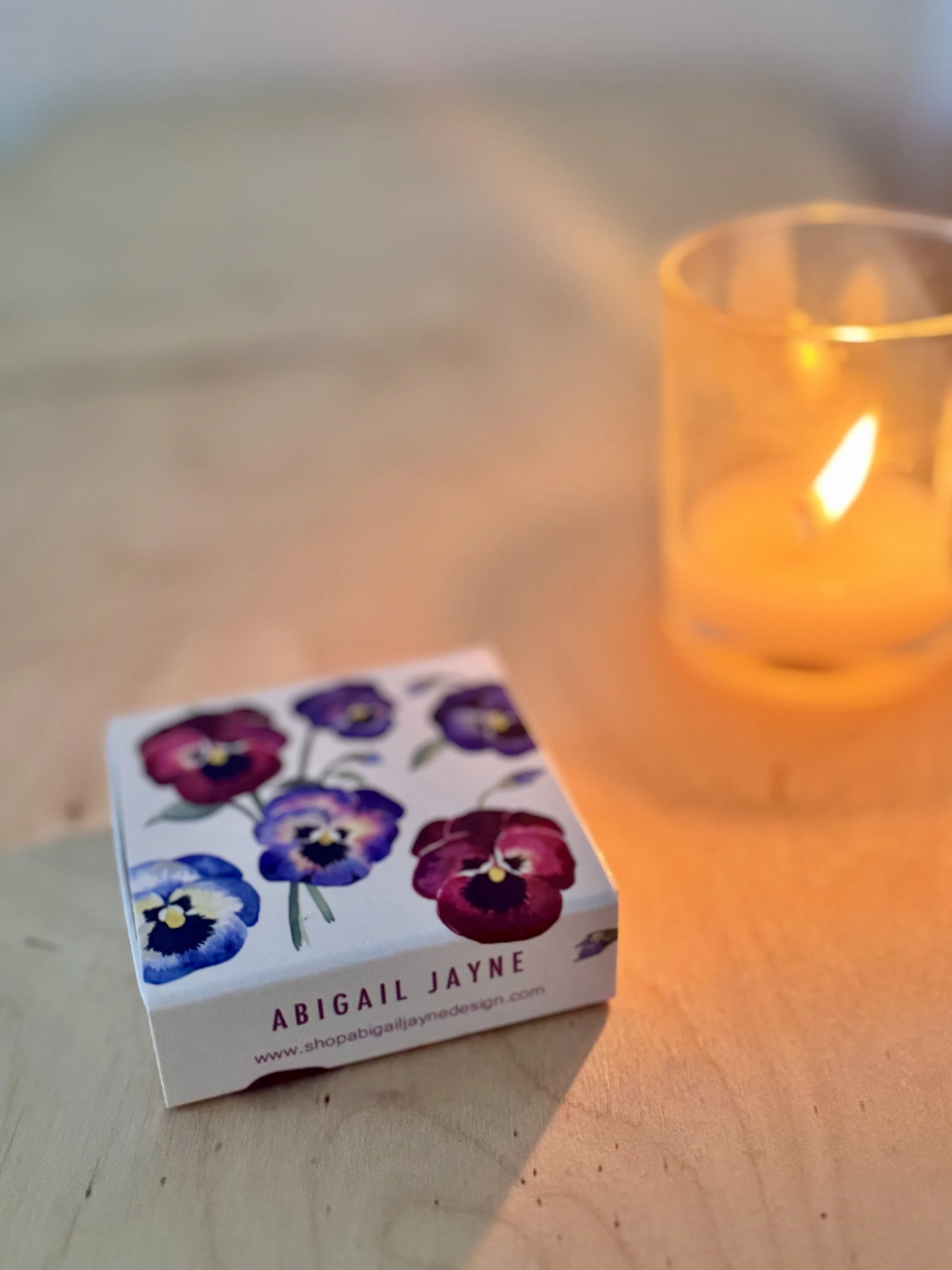 Abigail Jayne Design Pansy matches with candle.jpeg