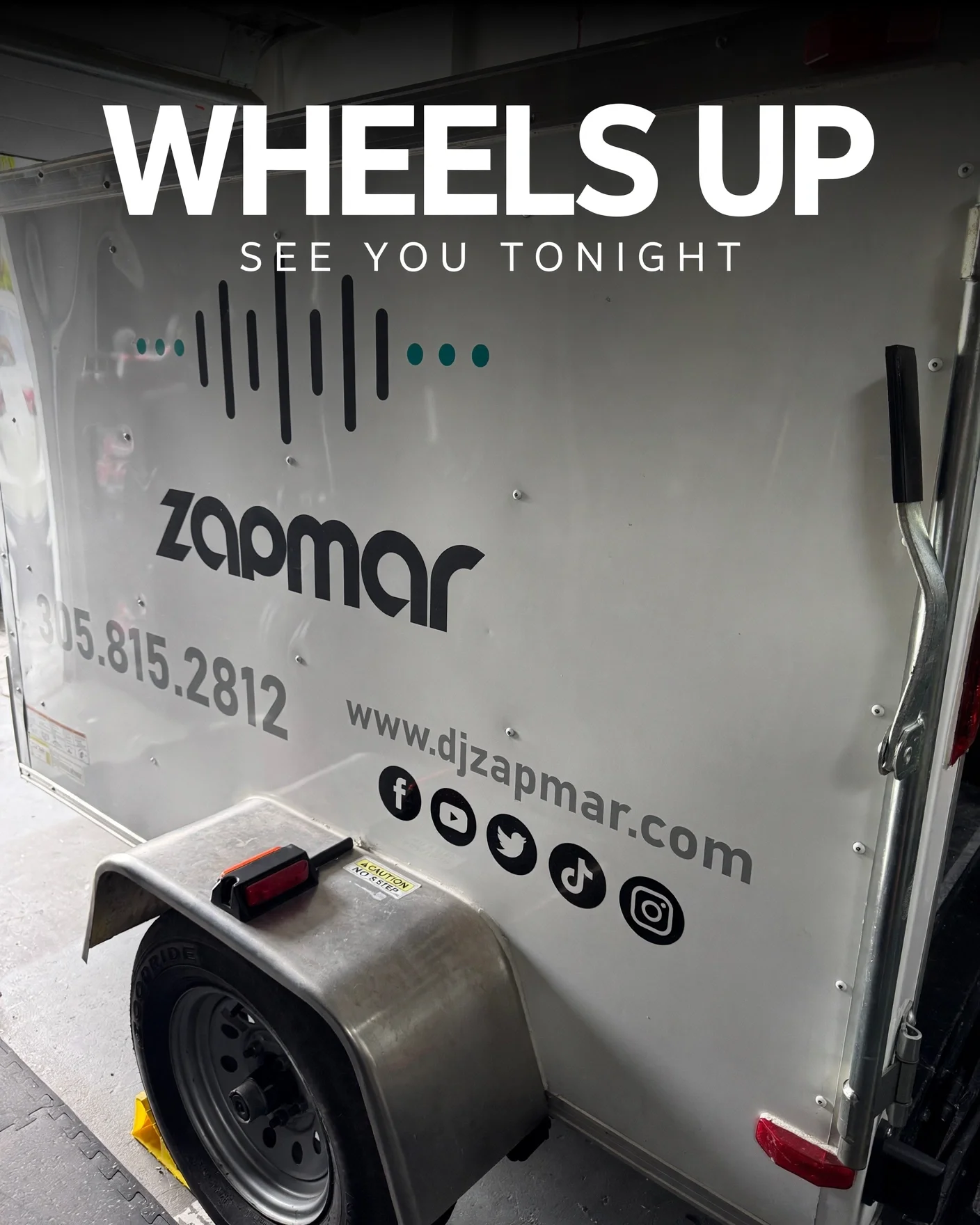 DJ Zapmar trailer with logo, phone number, and website
