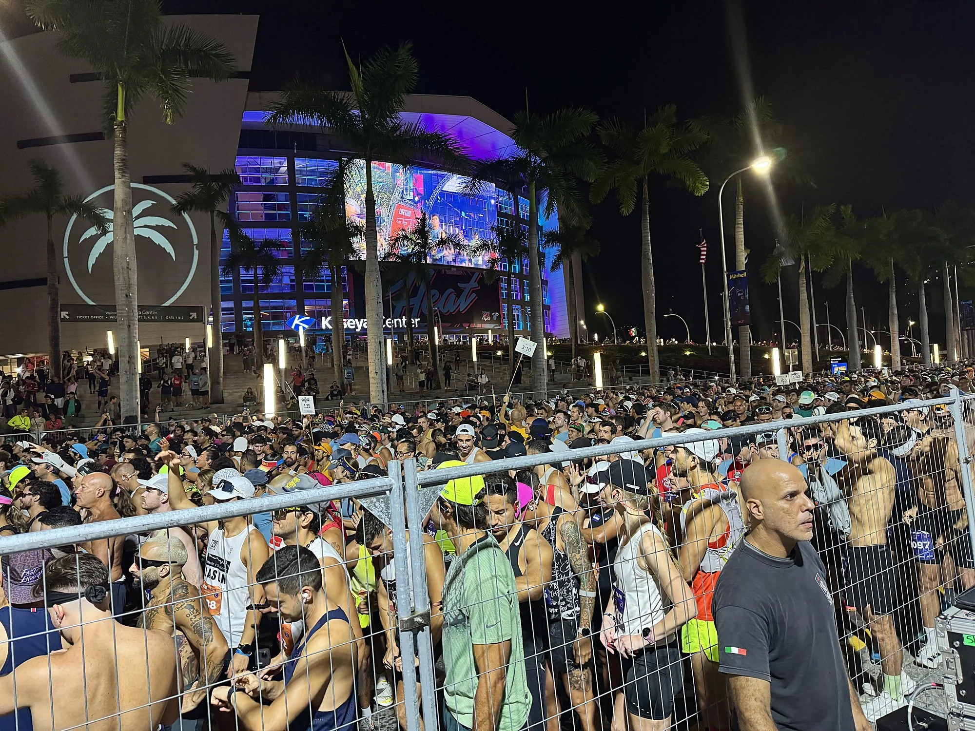 Thousands of runners packed into the start corral at the Life Time Miami Marathon and Half in front of the Kaseya Center