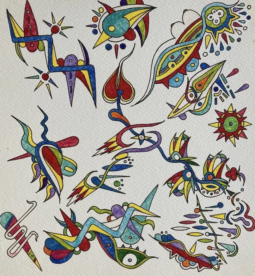 Colorful abstract scribbles and doodles on white paper with various shapes and patterns.