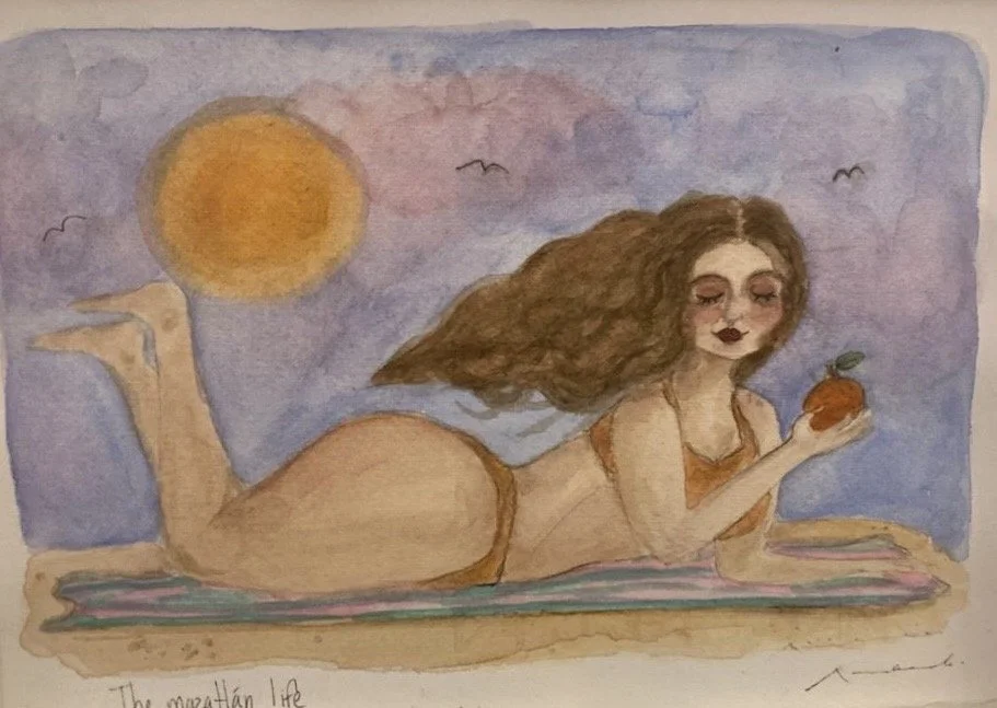 Watercolor painting of a woman with wavy brown hair lying on her stomach on a colorful blanket, holding an apple with a leaf against a background of a sunset sky with pink, purple, and blue hues and birds flying.