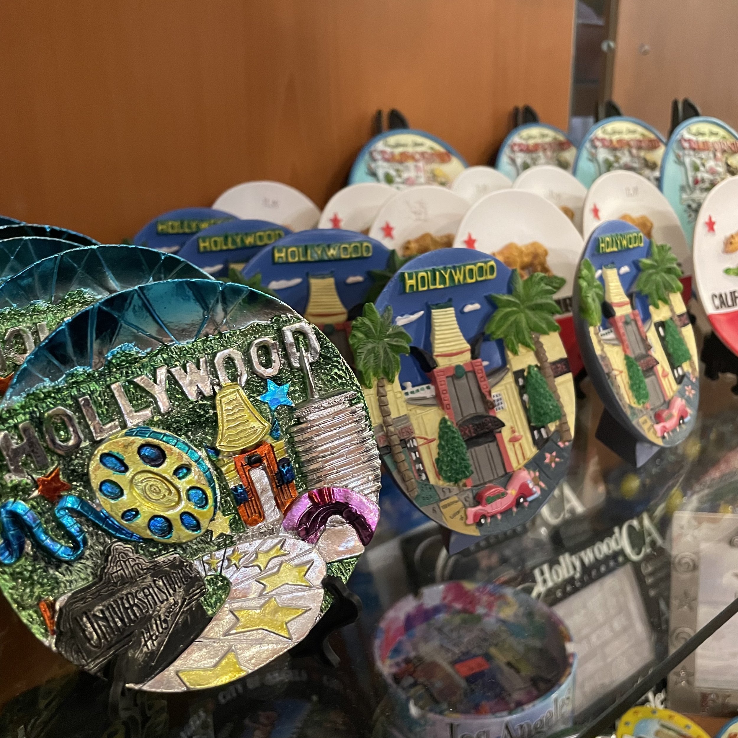 Hollywood souvenir plate with display stand available at The French Kitchen Convenience & Liquor Store in downtown Los Angeles