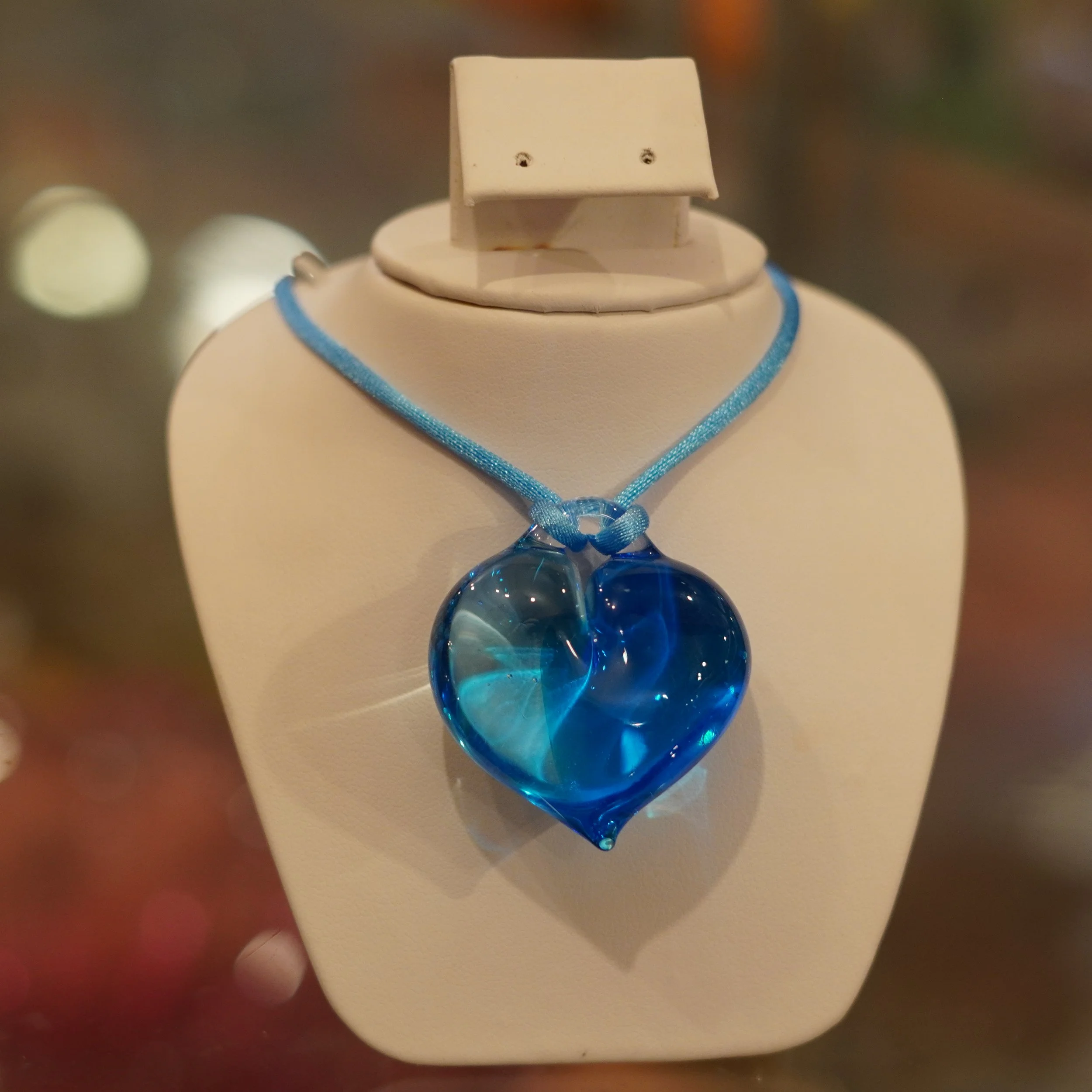 heart shape hand blown glass part of murano art available at The French Kitchen 4th floor Westin Bonaventure