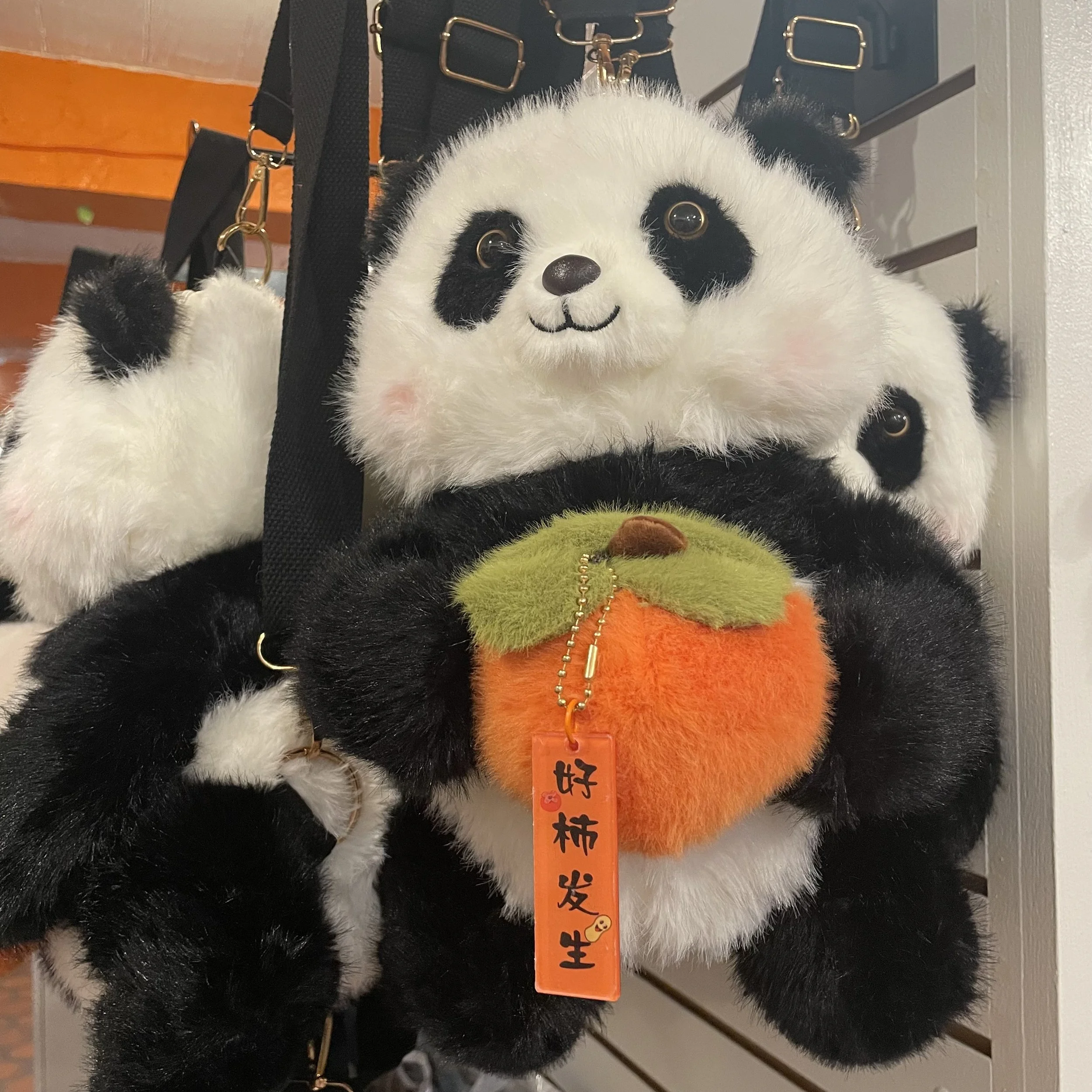 Cute panda backpack holding a peachat The French Kitchen Convenience & Liquor Store in downtown Los Angeles