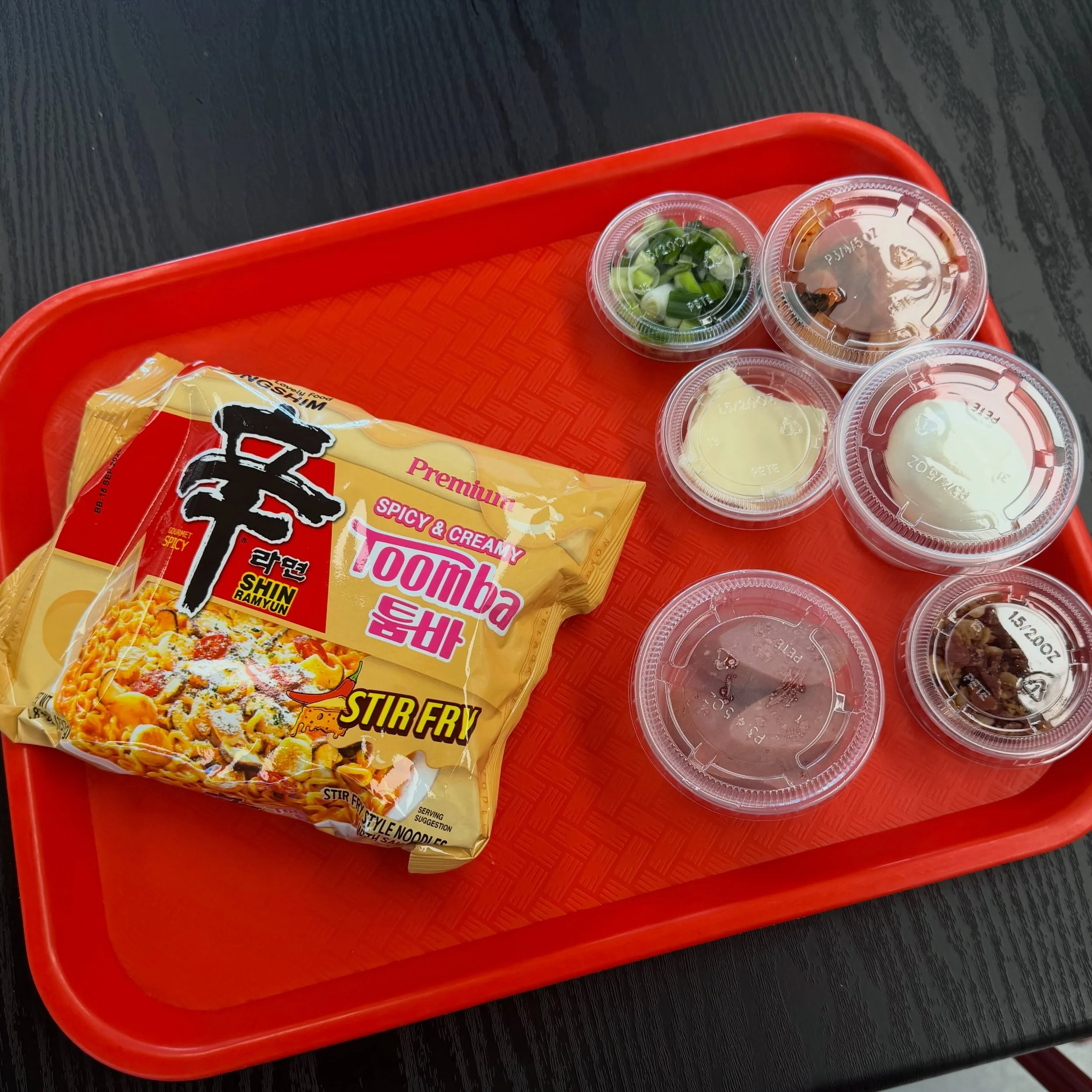 Swipe for after &mdash;> 😋
Toomba Shin is the perfect stir fry ramyun for those that want some heat, but just a little 😝 
We&rsquo;ve added some sausage, egg, bacon, cheese and green onion to make the yummiest bowl to satisfy your cravings 🤤
#u