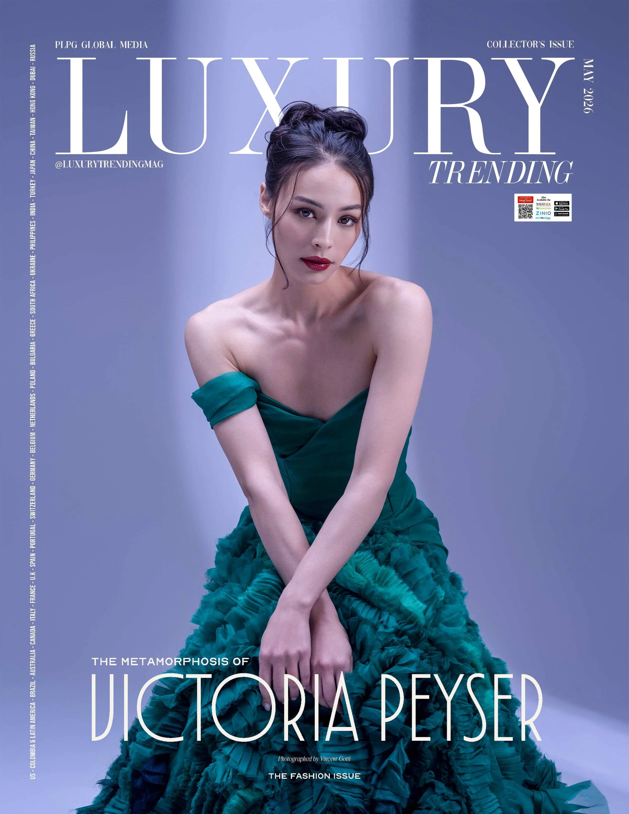 Magazine cover featuring a woman with dark hair styled in an updo, wearing a strapless green dress with a ruffled skirt. The background is a gradient of purple and blue. The text on the cover includes the title 'LUXURY' and mentions topics such as 'T