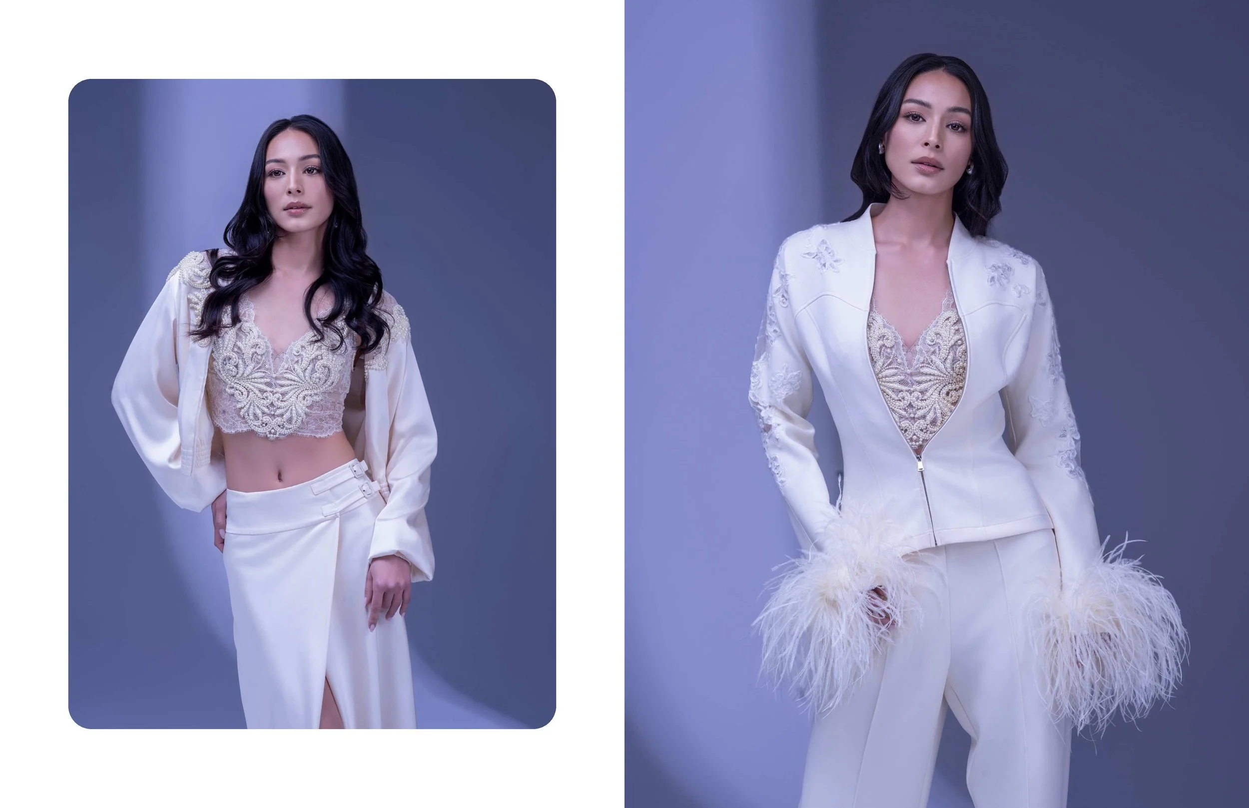 Two women dressed in white outfits pose against a plain background, one with black wavy hair and the other with short black hair styled in loose waves.