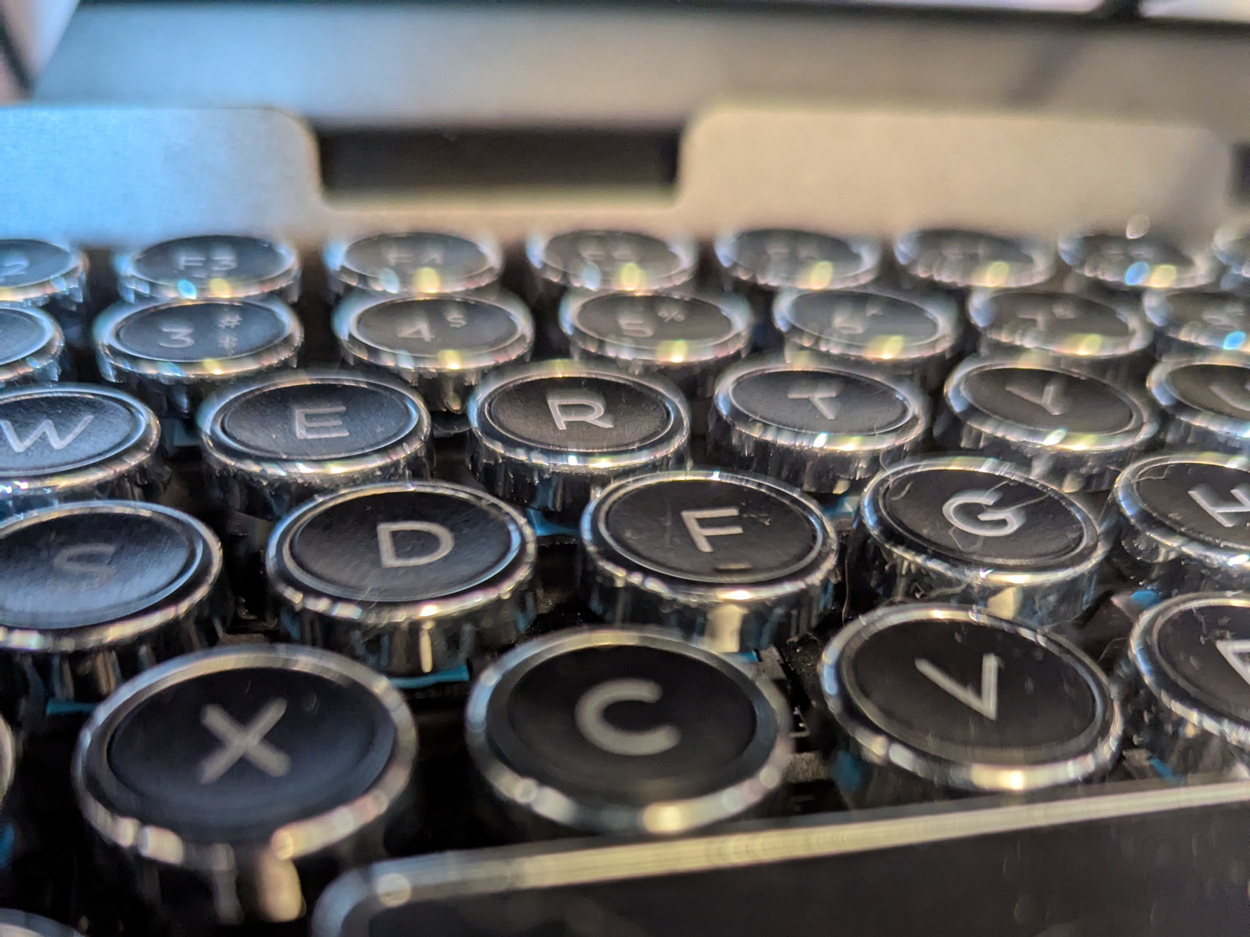 typewriter keys on a mechanical typewriter keyboard