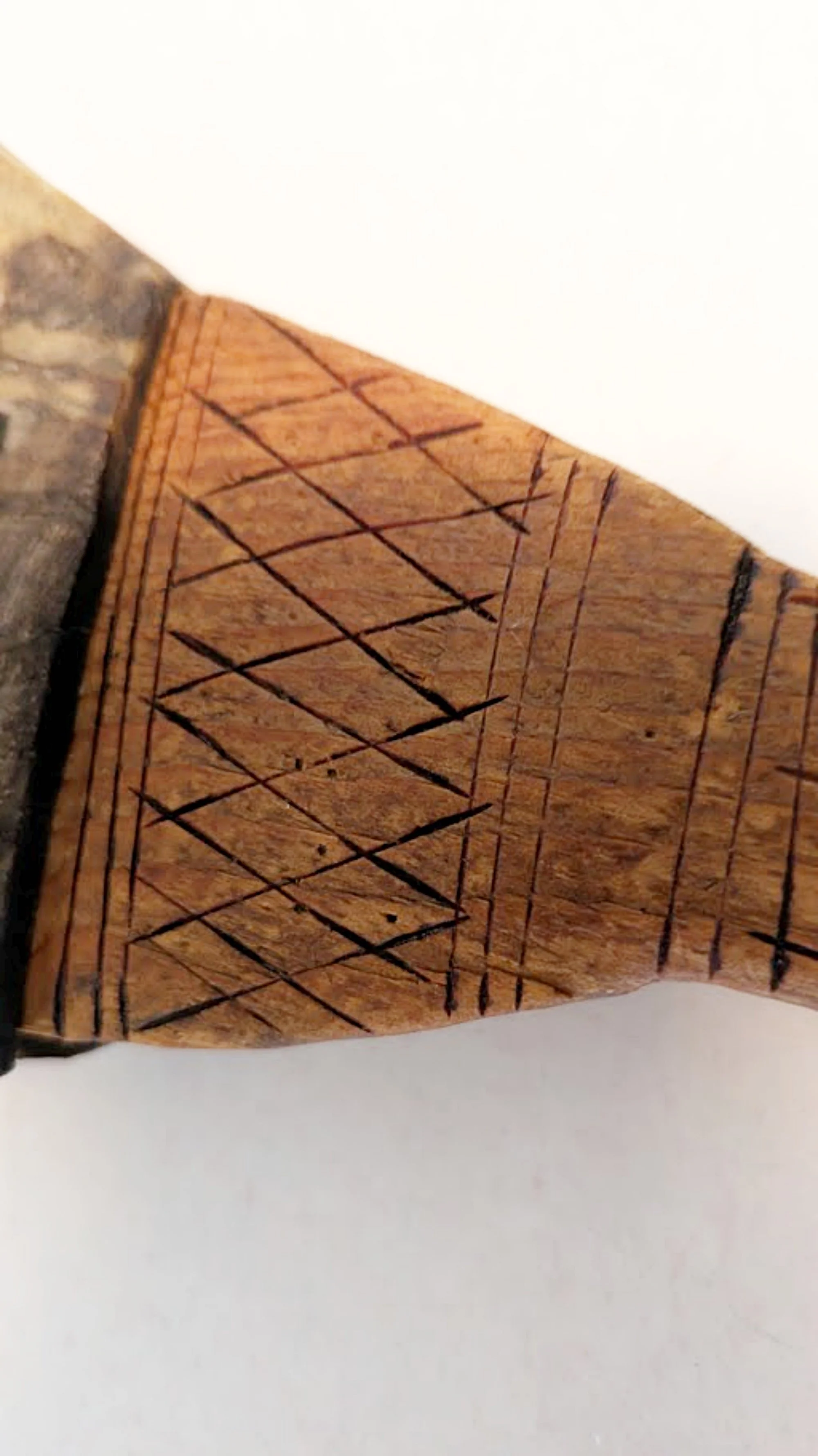 African Carved Wooden Fiber Comb with Forged Iron Spikes-Facing close up top of handle-2000 x 3559.jpg