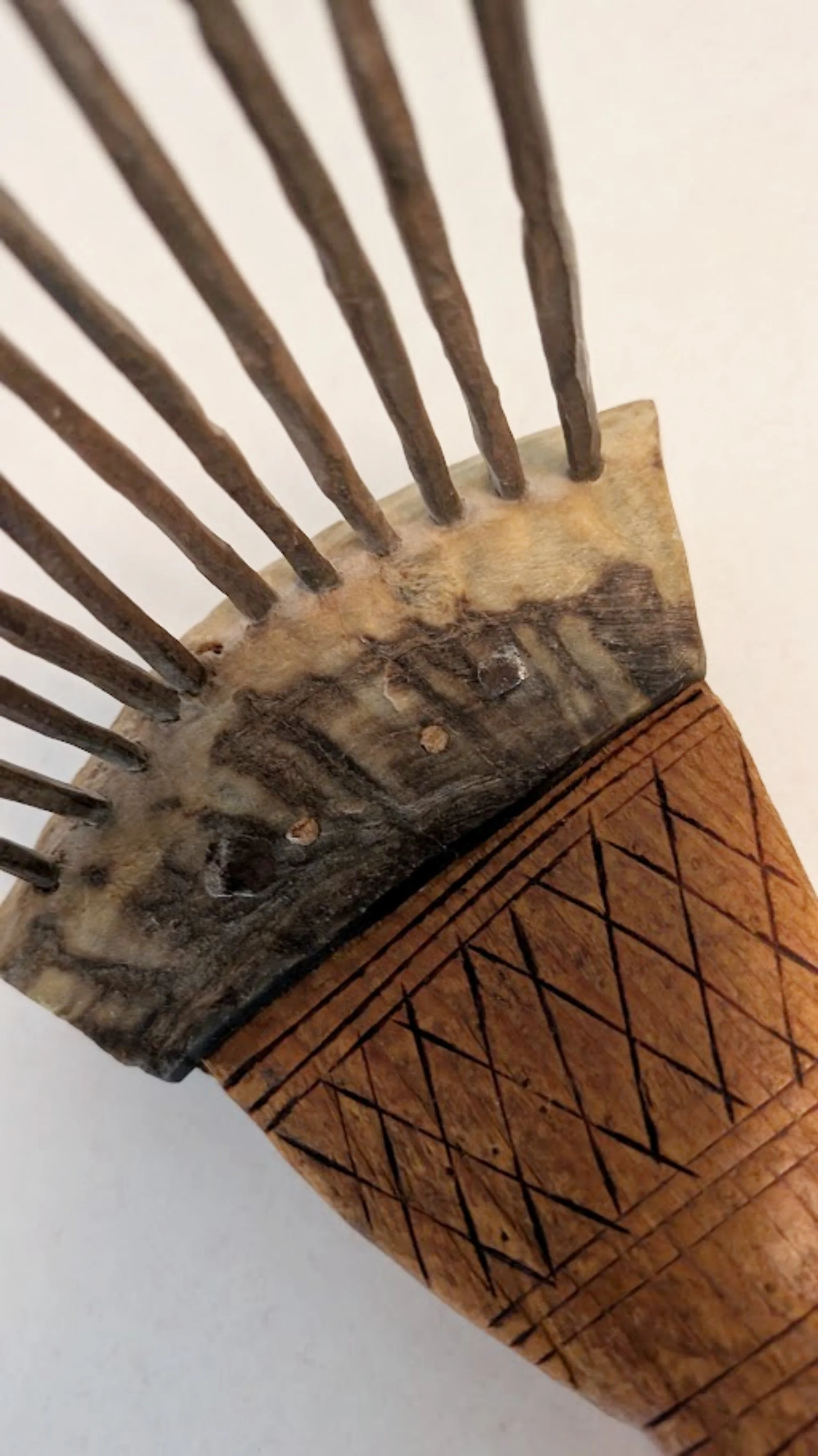 African Carved Wooden Fiber Comb with Forged Iron Spikes-Facing-Front-Spikes-Up-handle-down-2000 x 3559.jpg