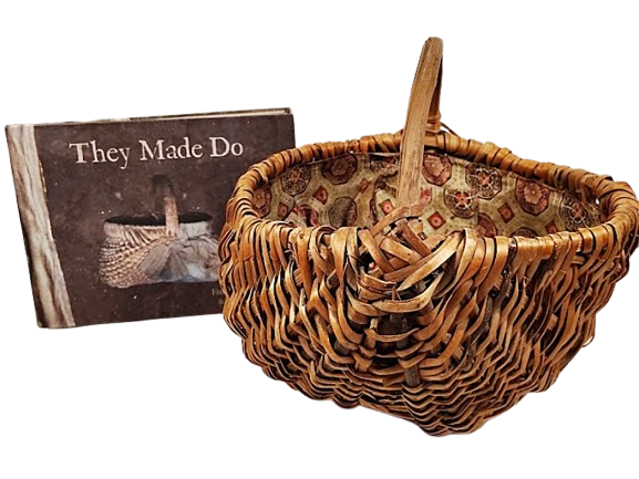 5511-Vintage_WILLOW_MELON_BASKET_Handmade_Primitive_with_Make-Do_Cloth_Liner-with_book-800_x_600-removebg-preview.png