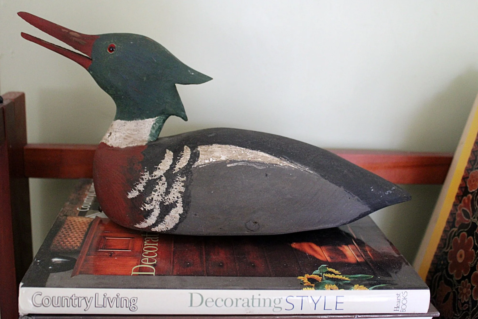 5757-CHARLES W. WATERFIELD Red Breasted Merganser Decoy-Sitting-on-books-2000 x 1333.JPG