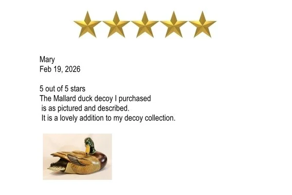 A review letter dated February 19, 2026, with five gold stars, praising a Mallard duck decoy purchased by the reviewer named Mary. The letter states the decoy is as pictured and described and is a lovely addition to her decoy collection. There is an image of a wooden Mallard duck decoy at the bottom of the letter.