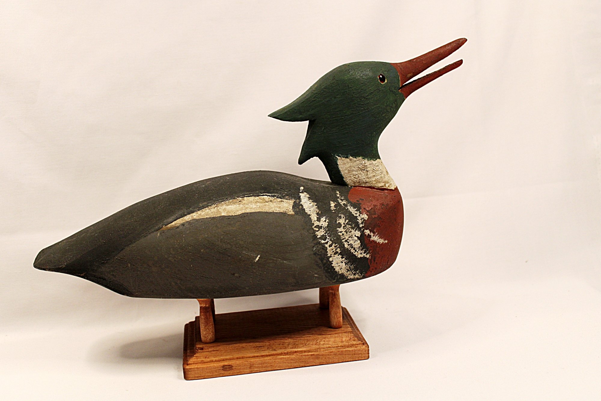 5757-CHARLES W. WATERFIELD Red Breasted Merganser Decoy-Facing-Full-Right-on-Stand-2000 x 1333.JPG