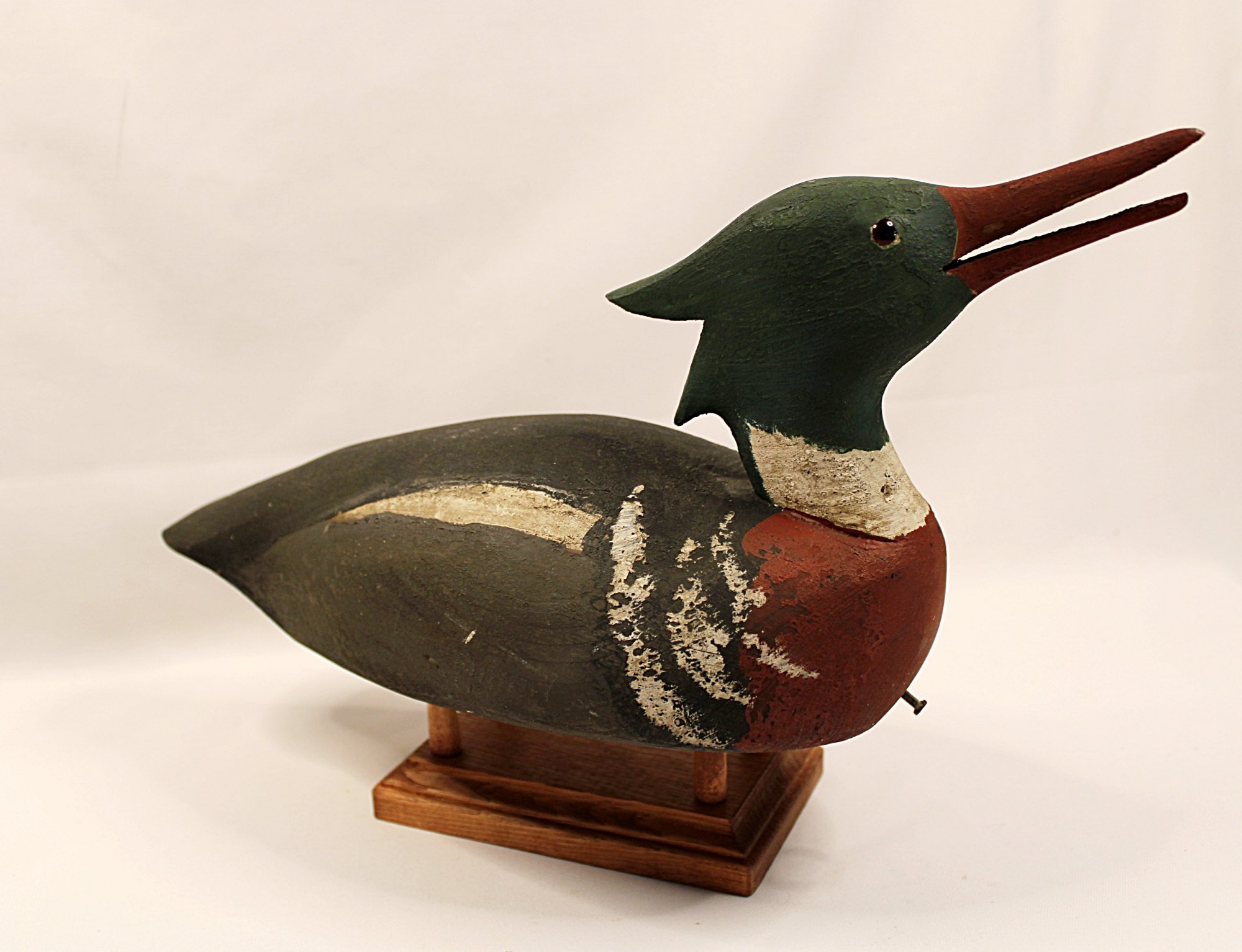 5757-CHARLES W. WATERFIELD Red Breasted Merganser Decoy-Facing-Right-on-Stand-2000 x 1534.JPG