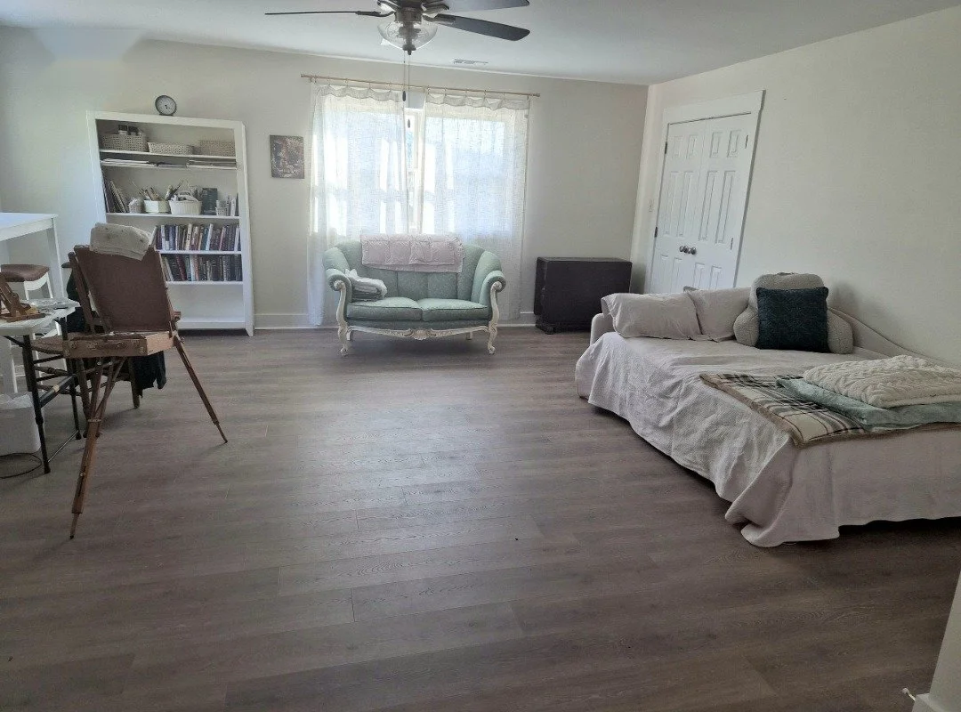 One floor running room to room ties the addition together