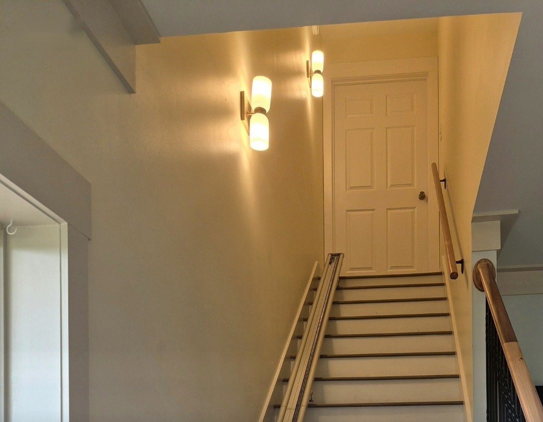 LVP on the stairs: new treads with white risers to match the floors