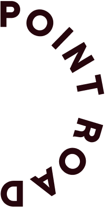 Text reading 'POINT ROAD' in a circular arrangement, with the words 'POINT' and 'ROAD' separated and curved along the edges.