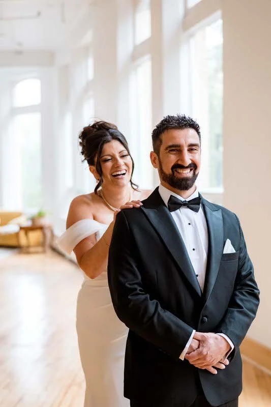 Bride and groom first look moment at The Harlow Exchange wedding venue in Winnipeg's Exchange District