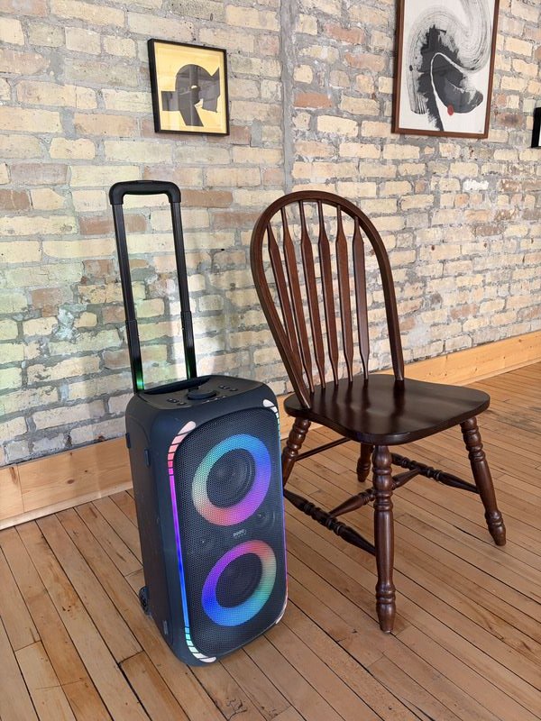 Large rolling Bluetooth party speaker with colorful LED light rings at The Harlow Exchange event venue in Winnipeg