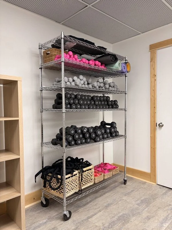 Fitness equipment available for rent at The Harlow Exchange event venue in Winnipeg including yoga mats, weights and resistance bands