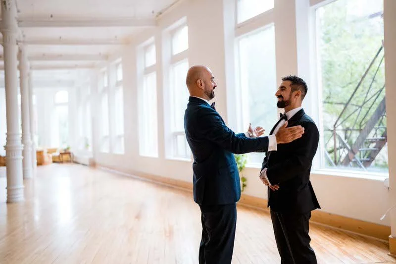 Wedding ceremony first look at The Harlow Exchange in Winnipeg's Exchange District