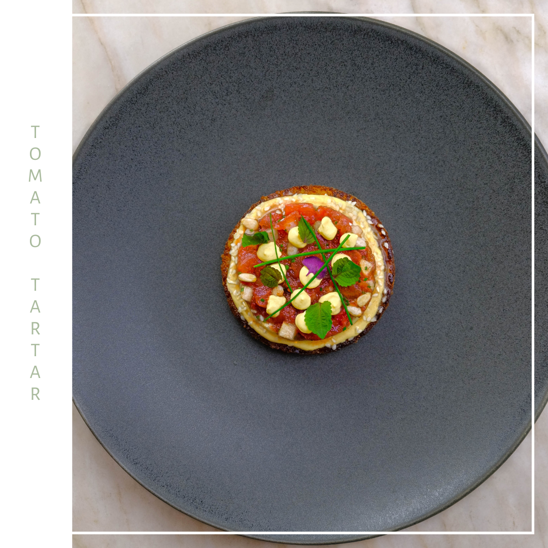 tomato tartar tart with pine nuts  and a creamy sauce