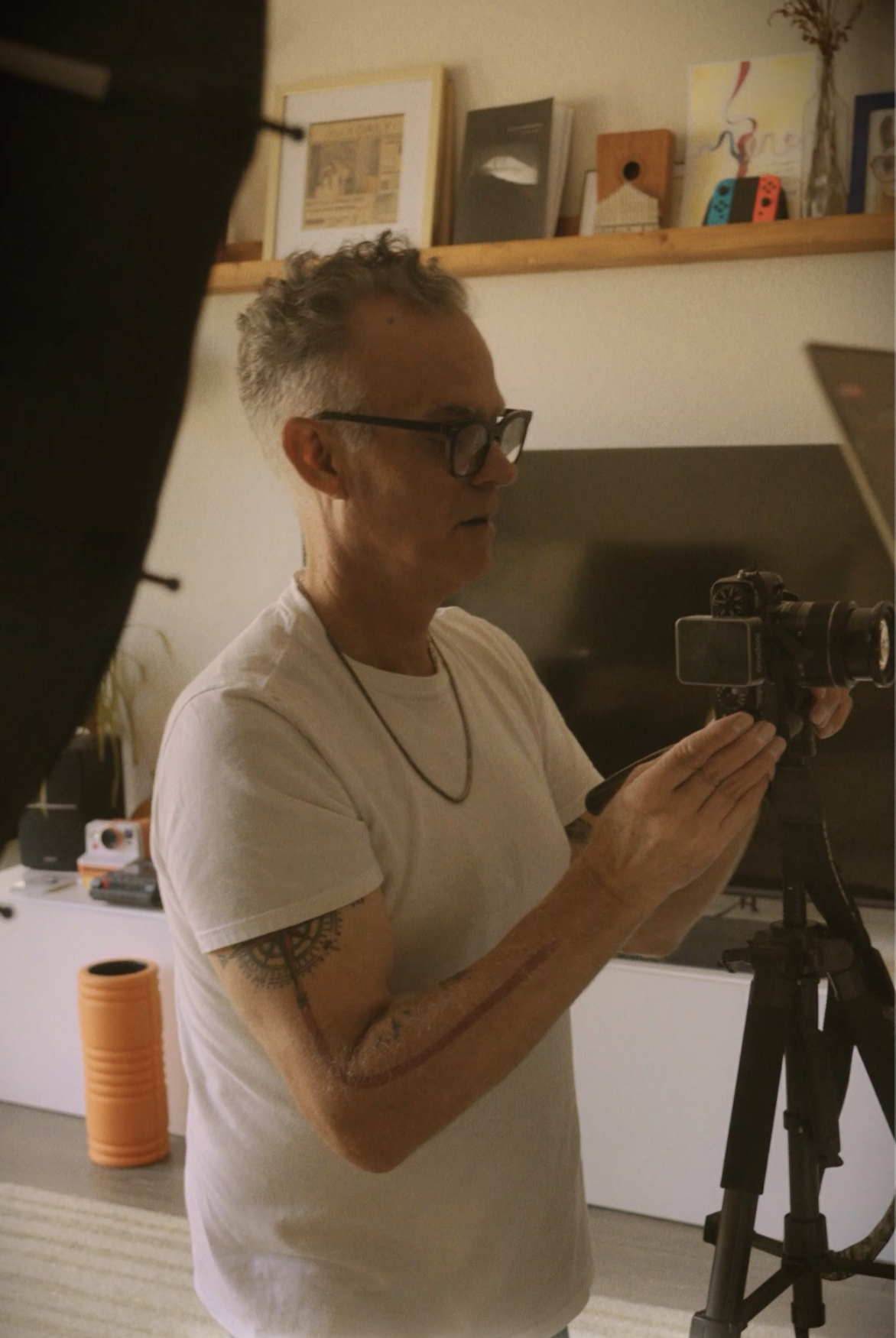 a color vintage photo of Stephen taking a photo