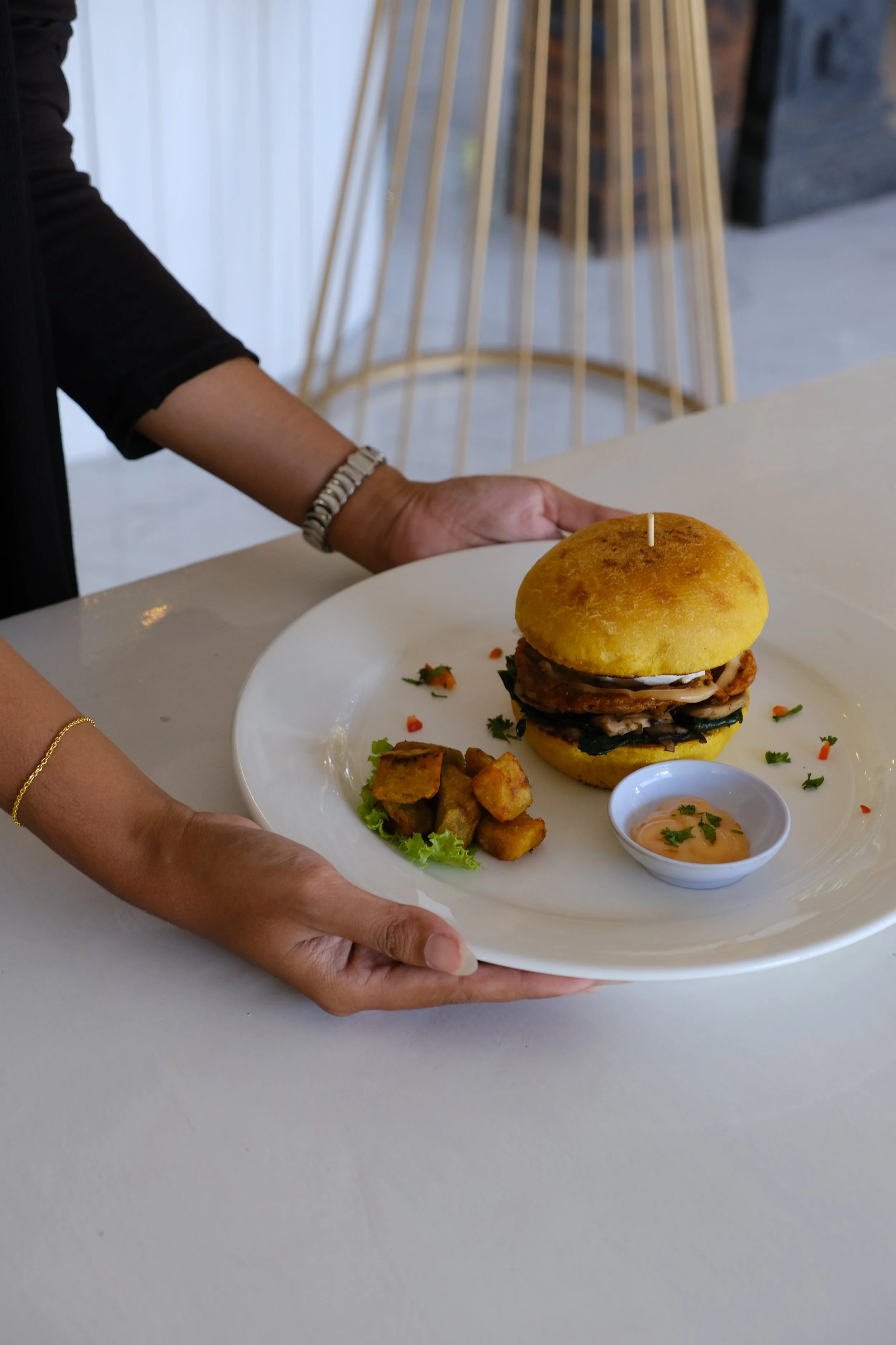 The Signature Unity Burger at Unity Cafe Bali is really popular for a healthy lunch in Ubud, even loved by those who are not strictly vegetarian.