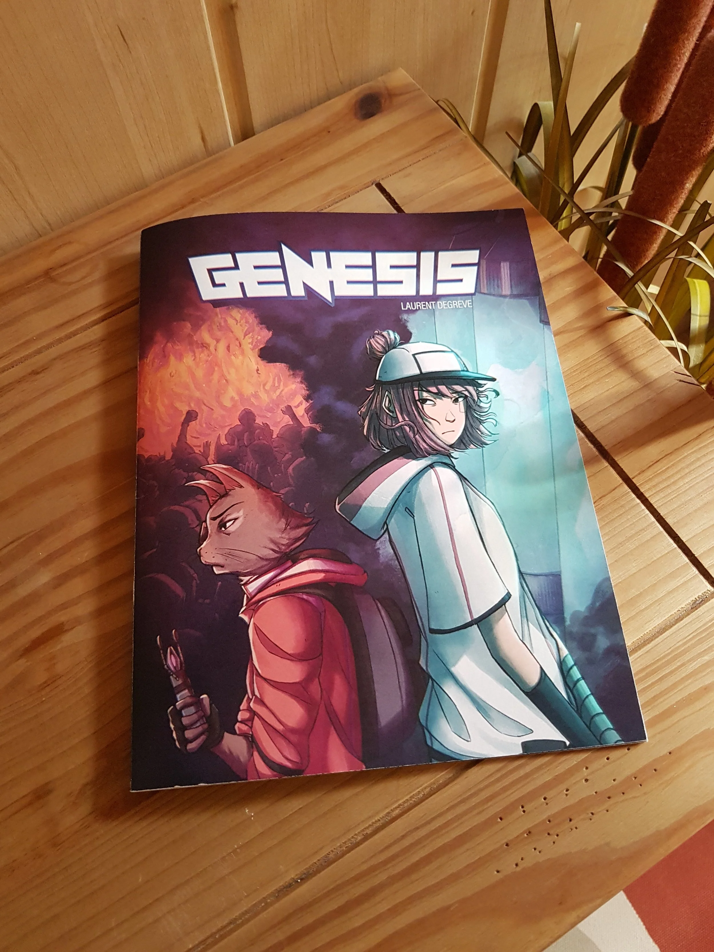 Photo de la bande-dessinée "GENESIS" par Laurent Degreve aka Neytix, représentant les personnages Lucy et Eugène sous un fond coloré et futuriste à l'image de la BD.