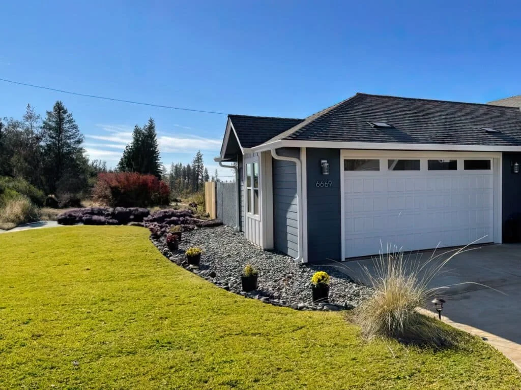 Home with maintained defensible space and clear landscaping around the property