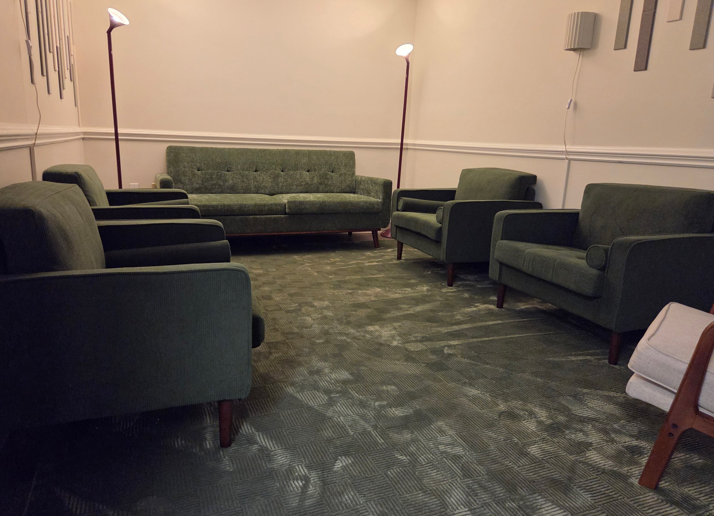 A cozy group room for a welcoming space to connect with others on a healing journey.