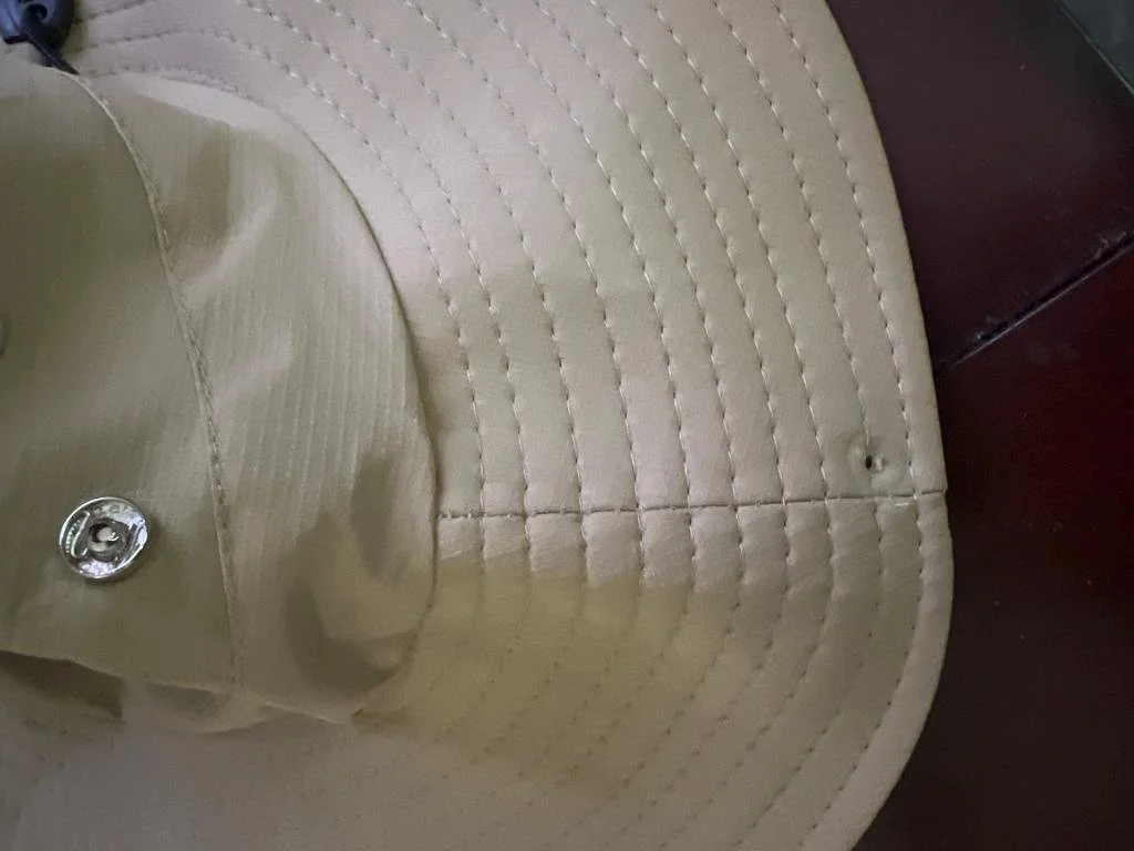 A broken fastener on a Stealie Mandala Safari Hat